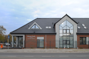 A building covered with anthracite engobe Monza roof tile