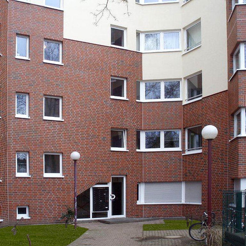 Single-family houses made of Westerwald shaded smooth brick
