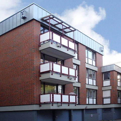 Single-family houses made of Westerwald shaded smooth brick