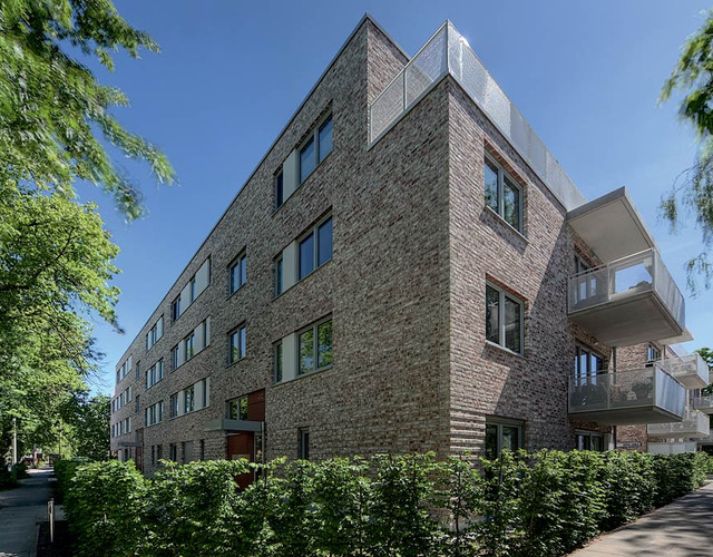 Residential buildings made of white shaded Geestbrand brick