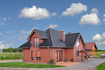 A single-family house covered with MONZAplus tobago