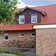 A single-family house covered with copper engobe Bornholm tiles