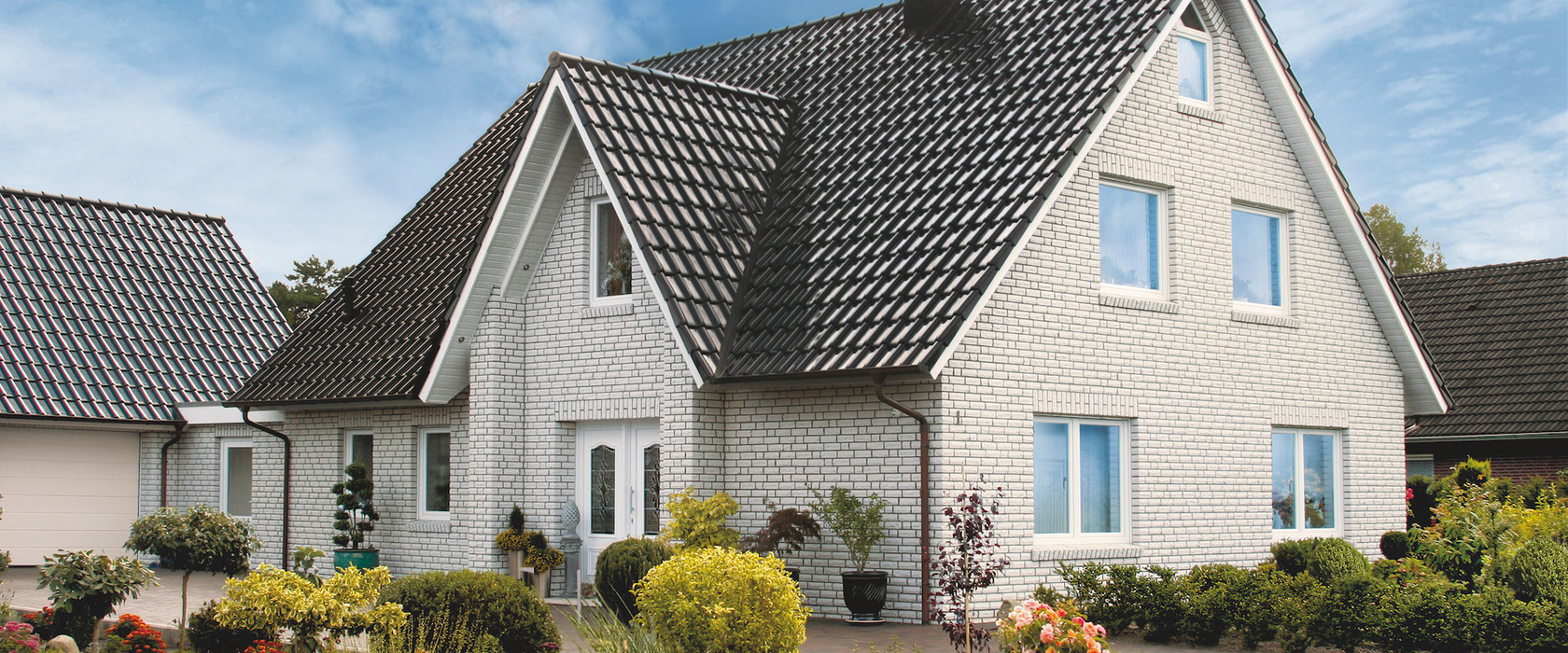 A single-family house covered with Piemont tile A single-family house covered with Piemont tile