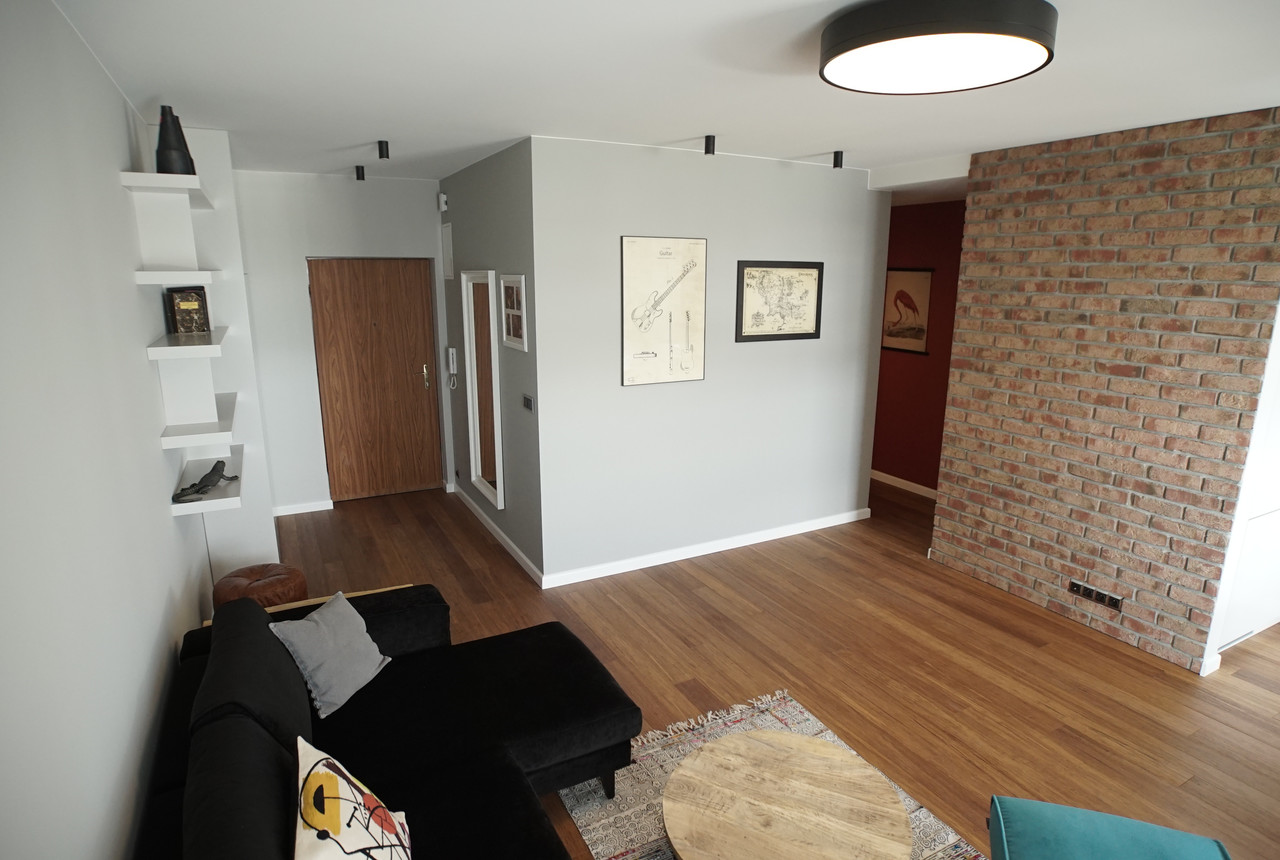 Living room with a brick wall Living room with a brick wall